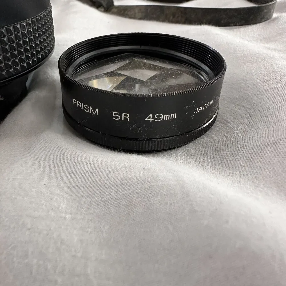 Panasonic Lens Adaptor Kit 49MM NDX4, Tele Conversion X1.5, Prism 5R 49MM